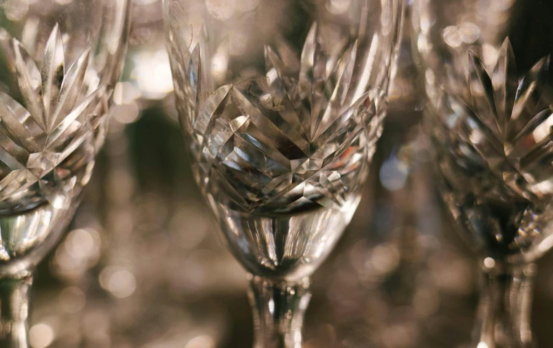 closeup s of wine glasses sitting side by side