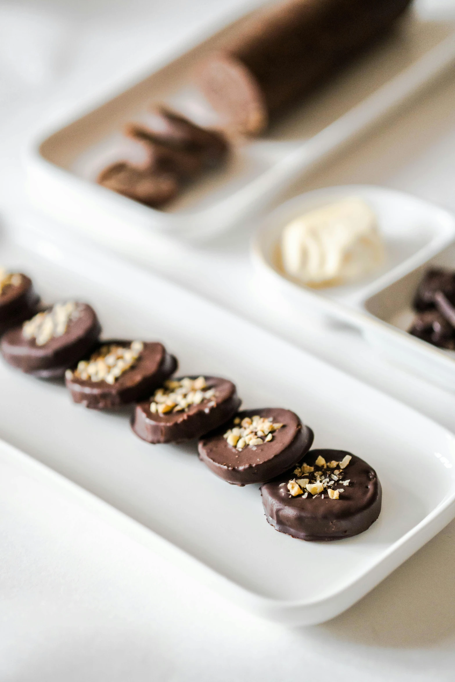 several pieces of chocolate on a white plate