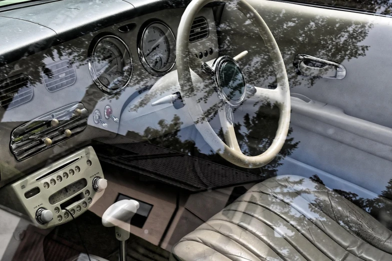 a close up of a car dashboard with a steering wheel, a portrait, by Derek Hill, retrofuturism, tonemapped, reflections. shady, mercedes, translucent white skin