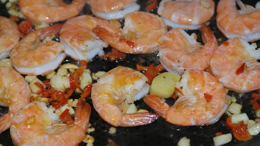 a frying pan filled with shrimp and vegetables, by Tom Carapic, flickr, hurufiyya, ultrafine detail ”, half done, nut, bo chen