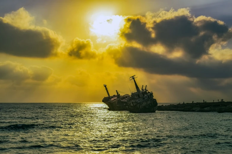 a ship sitting on top of a body of water, a photo, shutterstock, romanticism, dredged seabed, the sun up on the sky is strong, aruba, stock photo