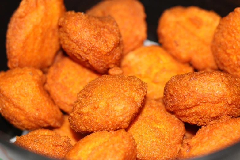 a bowl filled with tater tots sitting on top of a table, by Matt Cavotta, flickr, hurufiyya, orange rocks, depth detail, indian, vishnu