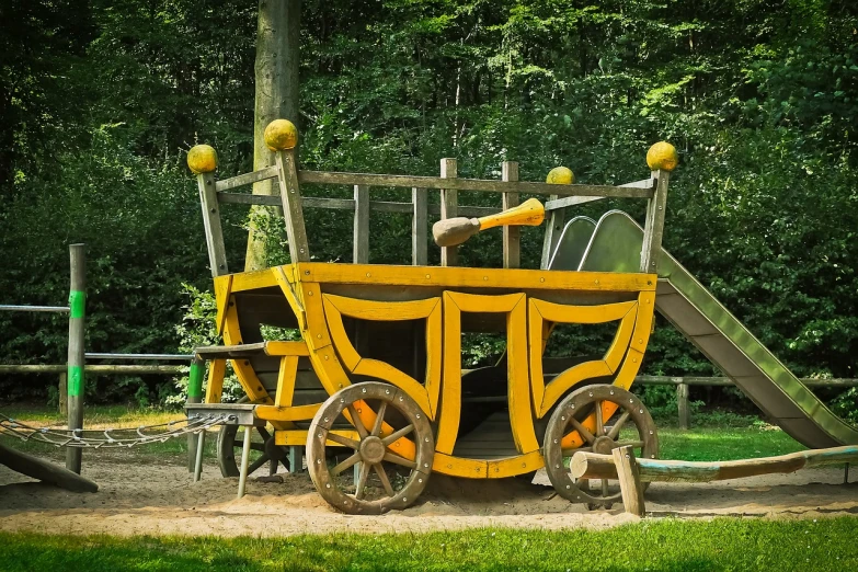 a children's play area in a park, a photo, by Jan Stanisławski, shutterstock, renaissance, chariot, yellowed with age, highly detailed photo, digitally painted