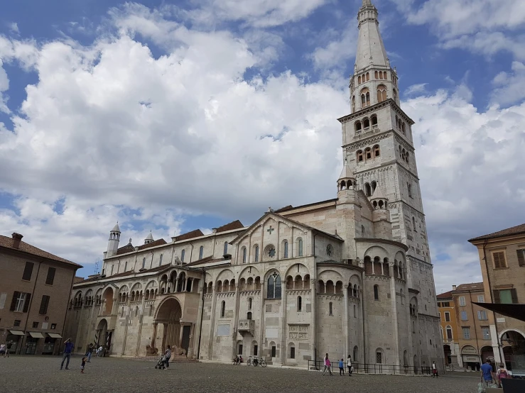 a large white building with a clock tower, a photo, by Alessandro Galli Bibiena, romanesque, lead - covered spire, italian looking emma, touring, finally