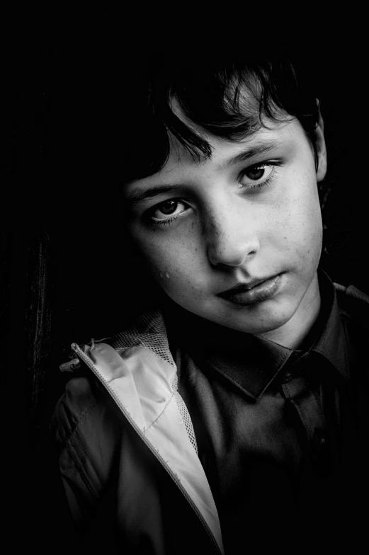 a black and white photo of a young boy, a character portrait, inspired by Antanas Sutkus, fine art, finn wolfhard, detailed high contrast lighting, 🤤 girl portrait, sigma 85/1.2 portrait