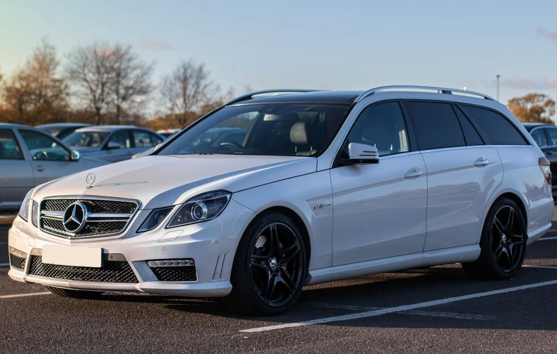 a white mercedes benz benz benz benz benz benz benz benz benz benz benz benz benz benz benz, a picture, by Daniel Seghers, pexels, purism, black rims, with a roof rack, # e 4 e 6 2 0, not cropped