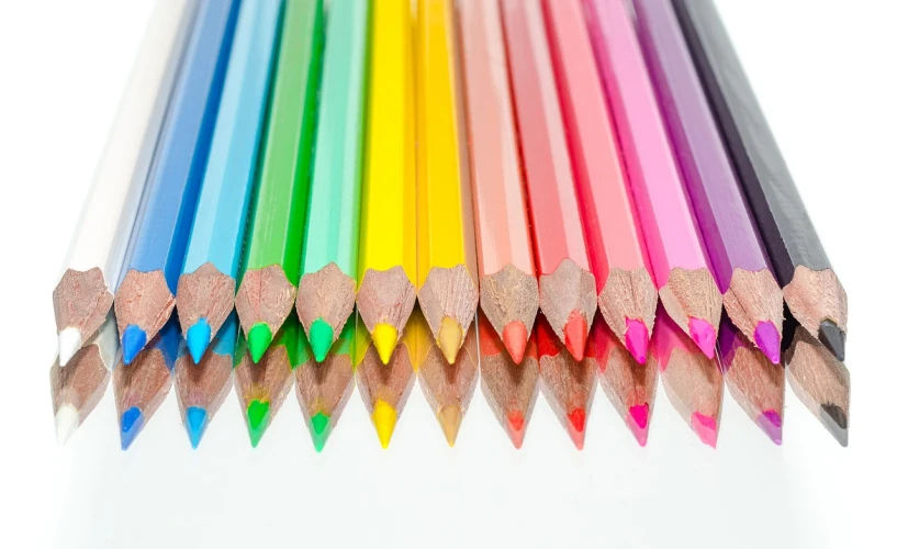 a group of colored pencils sitting on top of each other, a color pencil sketch, istockphoto, best on adobe stock, !pencil, view from bottom to top