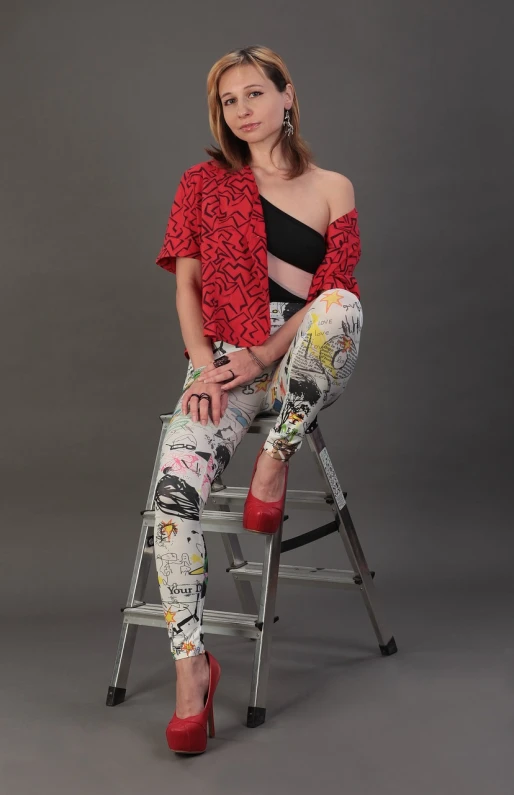 a woman sitting on top of a step ladder, a portrait, inspired by Judy Takács, pop art, leggins, outfit photo, red black white colors, ripped jeans