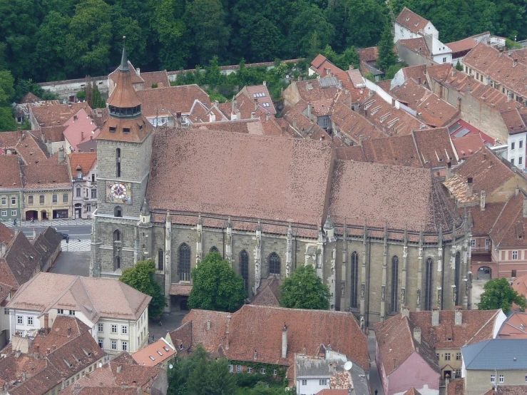 an aerial view of a city with a clock tower, a photo, romanesque, transylvania, july 2 0 1 1, cathedral!!!!!, detailed wide shot