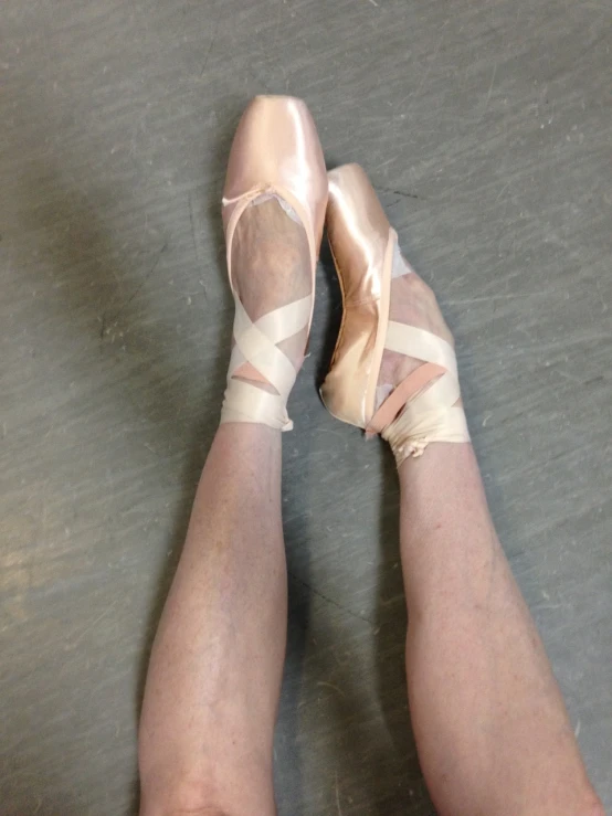 a close up of a person wearing ballet shoes, inspired by Elizabeth Polunin, flickr, iphone photo, terrified 👿, vsx, stems