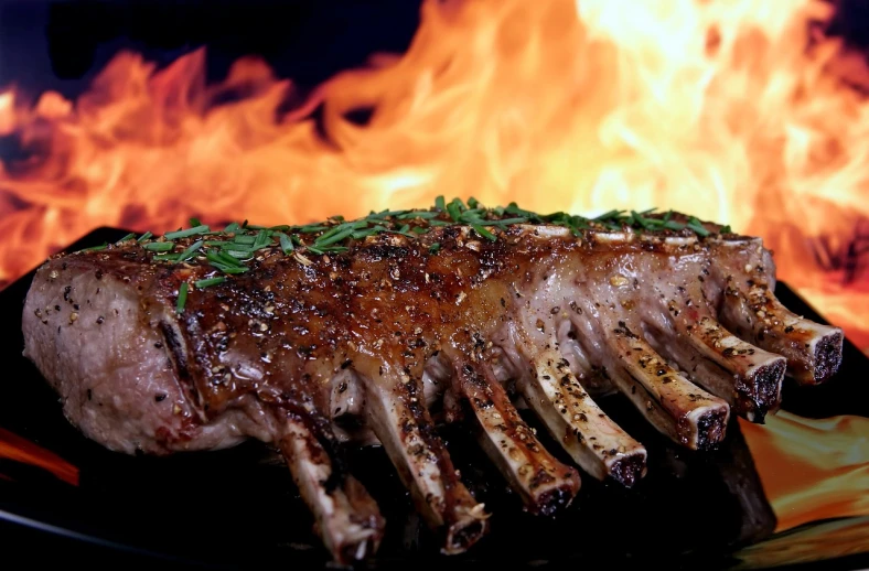 a piece of meat on a plate in front of a fire, a digital rendering, shutterstock, hurufiyya, serving rack of ribs, closeup 4k, curved horns!, grand finale