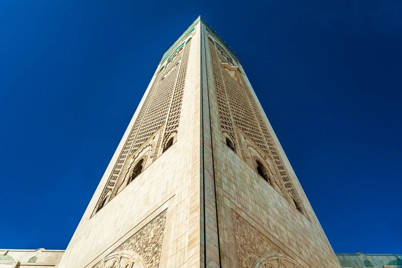 a tall building with a clock at the top of it, a picture, shutterstock, arabesque, morocco, ultra wide angle horizon, obelisk, epic detail