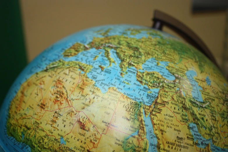 a close up of a globe on a table, a picture, middle eastern skin, extremely detailed and coherent, ebay photo, deeply detailed