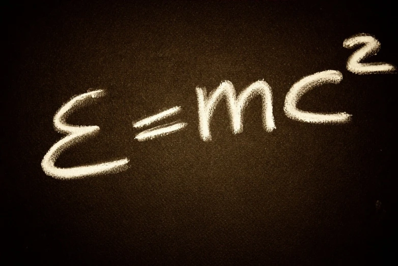 a chalkboard with the word e = mc written on it, a picture, by Adam Chmielowski, precisionism, modern scientific documents, equations, bottom angle, cute photo