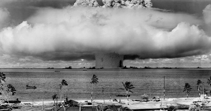 a black and white photo of a large mushroom cloud, by Willard Mullin, unsplash, nuclear art, beach surreal photography, irradiated humans, happy birthday, tsunami
