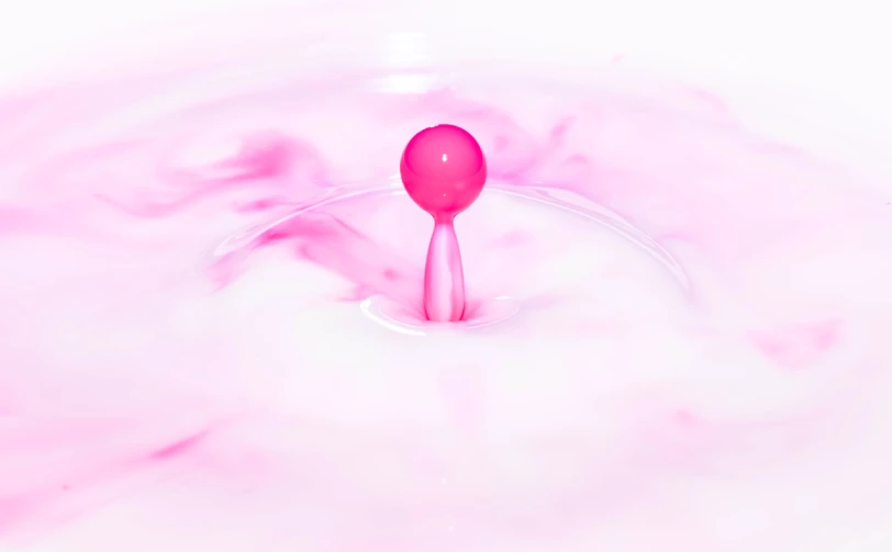 a spoon sticking out of a bowl of liquid, inspired by Cherryl Fountain, conceptual art, white and pink, abstract claymation, spherical, nipple