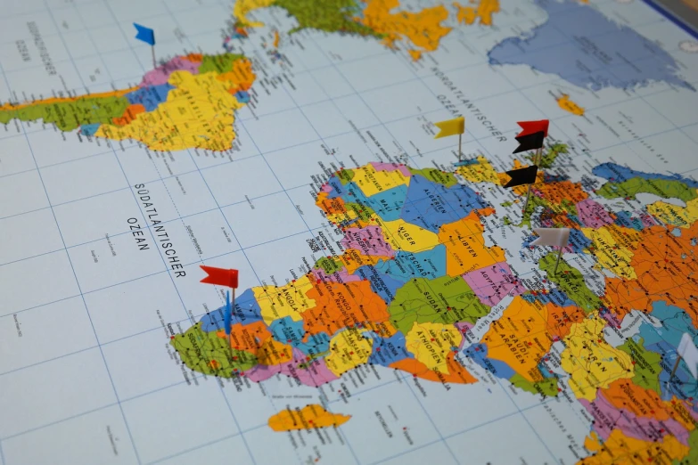 a close up of a map of the world, flags, 3 4 5 3 1, local close up, last photo