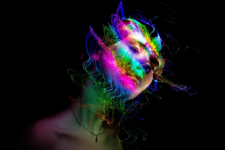 a close up of a person with neon hair, inspired by Alberto Seveso, psychedelic art, lightpainting motion blur, in the astral plane ) ) ), glowing rainbow face, trapped egos in physical reality