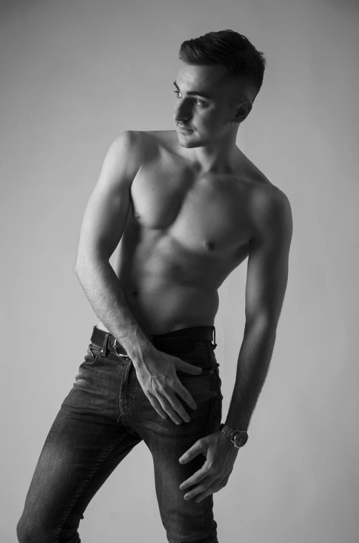 a black and white photo of a shirtless man, a photo, inspired by Adrian Zingg, flickr, fine art, wearing jeans, smooth contours, fashion portrait photo, dmitry prozorov style