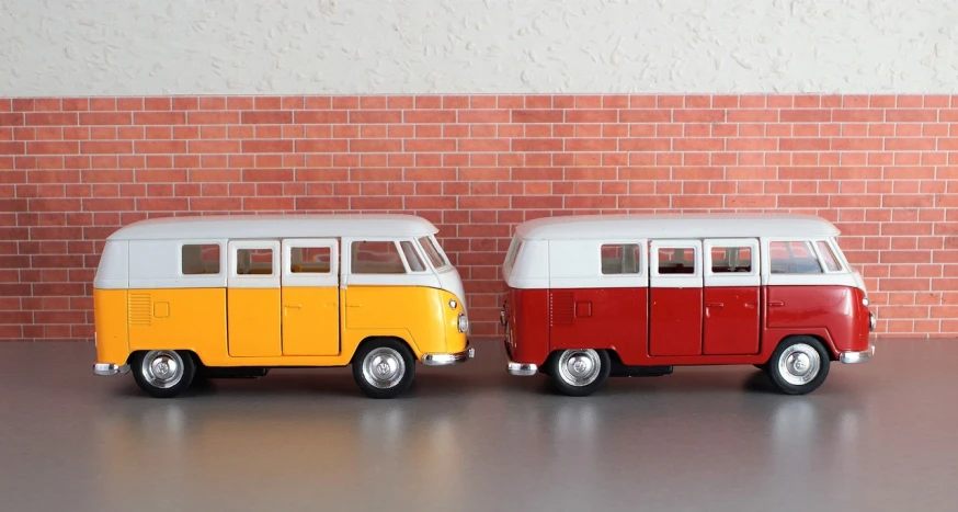 a couple of toy cars sitting next to each other, a picture, by Jan Kupecký, unsplash, folk art, kombi, red yellow, wallpaper - 1 0 2 4, front and side views