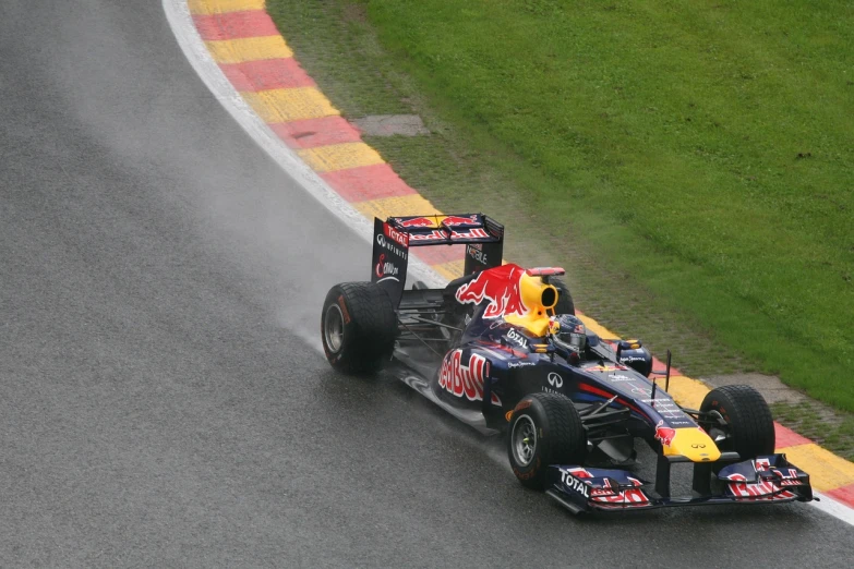 a red bull racing car on a race track, flickr, renaissance, wet boody, at circuit de spa francorchamps, karolina cummings, infinity