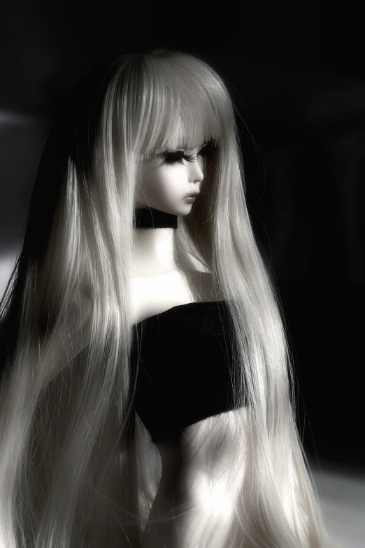 a close up of a doll with long hair, a raytraced image, inspired by Nene Thomas, tumblr, dramatic lighting !n-9, white and black, long blond hair, loneliness
