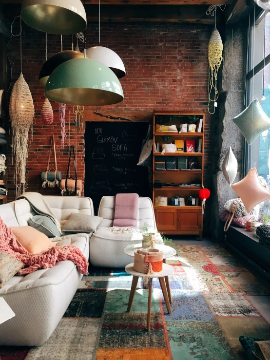 a living room filled with lots of furniture, a screenshot, pexels, maximalism, fluffy full of light, interior of a loft, things hanging from ceiling, brown and pink color scheme