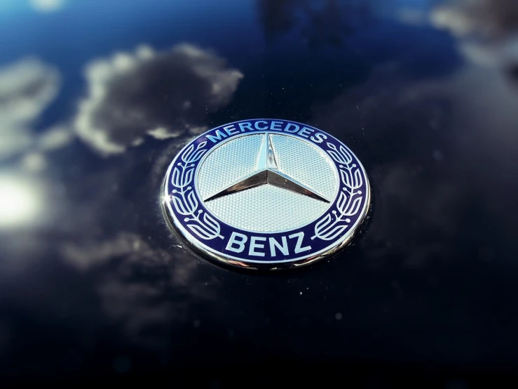 a mercedes benz emblem on the hood of a car, a 3D render, happening, 8k octane render uhd, blue realistic 3 d render, 1128x191 resolution, ((octane render))