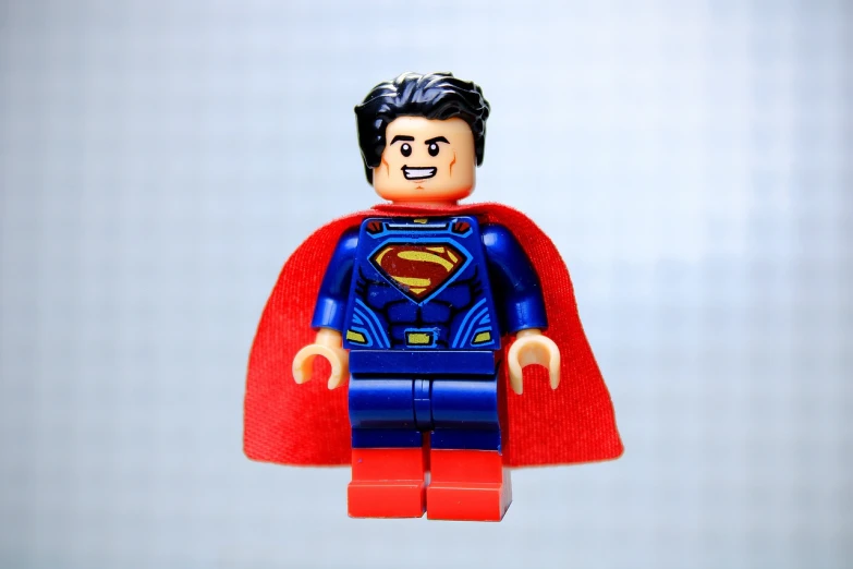 a close up of a lego superman figure, a picture, by Hiroyuki Tajima, pexels, superflat, karl urban, full body hero, full head shot, john redcorn