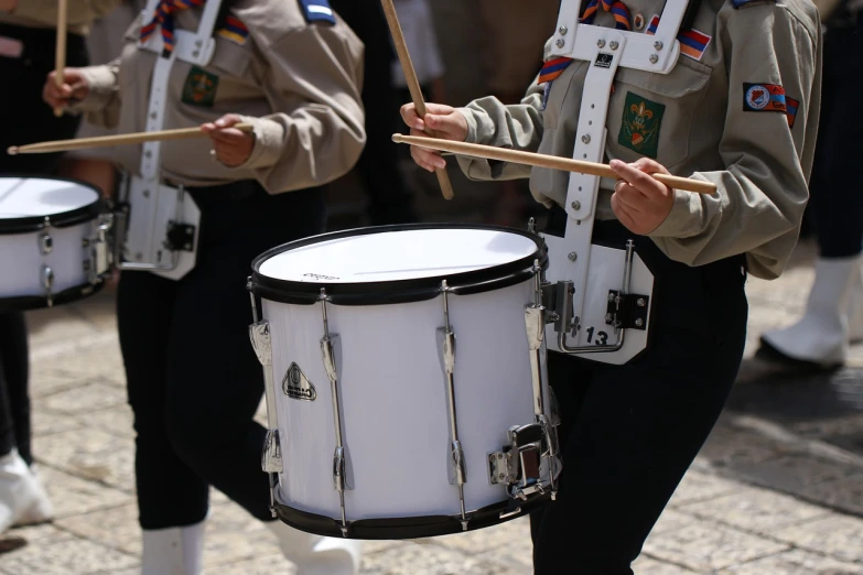 a group of people that are playing drums, by Steven Belledin, shutterstock, antipodeans, boy scout troop, jerusalem, closeup photo, stock photo