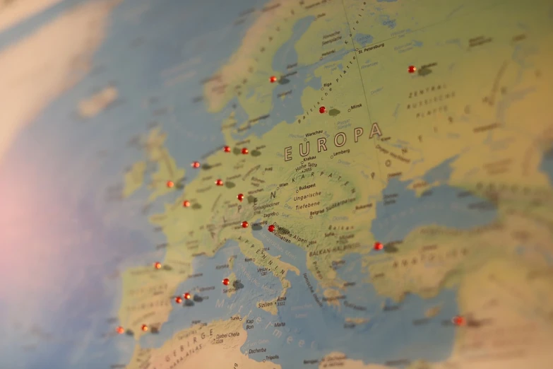 a close up of a map of europe, a tilt shift photo, by Emma Andijewska, video, pins, wip, brown