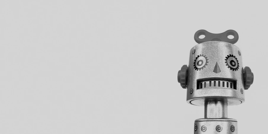 a black and white photo of a robot on a pole, unsplash, les automatistes, solid light grey background, banner, cogs, background image