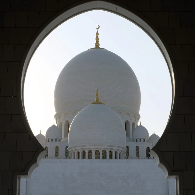 a large white building with a golden cross on top of it, a picture, by Sheikh Hamdullah, shutterstock, arabesque, inside a dome, smooth round shapes, arch, shade