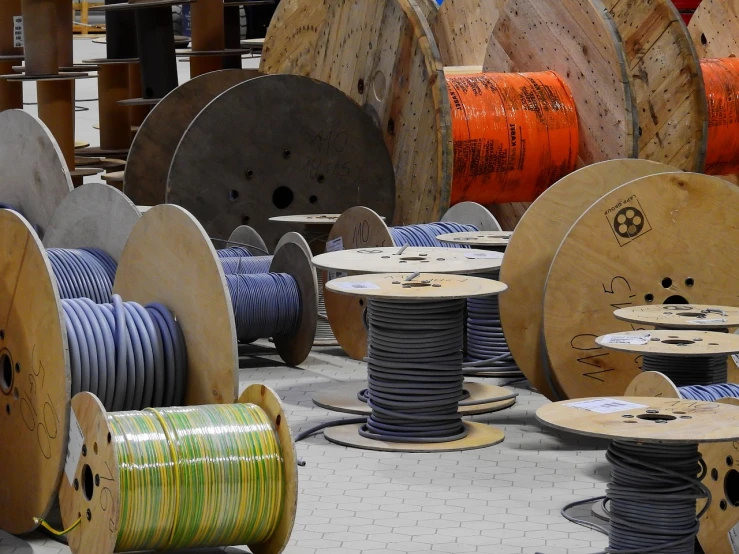 a room filled with lots of different types of wires, a picture, by Thomas Häfner, flickr, plasticien, barrels, inspect in inventory image, wires earth background, a wooden