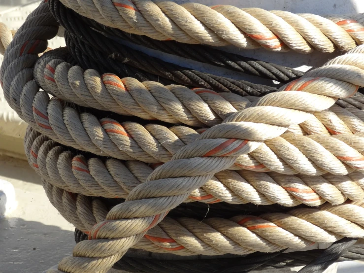 a close up of a rope on a boat, a photo, figuration libre, piled around, super detailed image, high res photo, high details photo