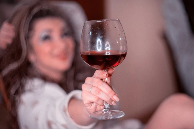 a close up of a person holding a wine glass, a portrait, by Alexander Fedosav, pexels contest winner, fun pose, enhanced quality, attractive female, grand!