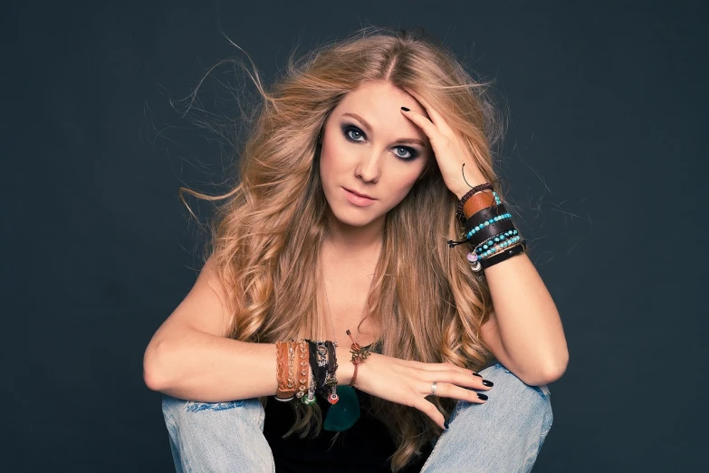 a woman sitting on a stool with her hands on her head, a photo, avril lavigne, bracelets, katherine mcnamara inspired, portrait of annasophia robb