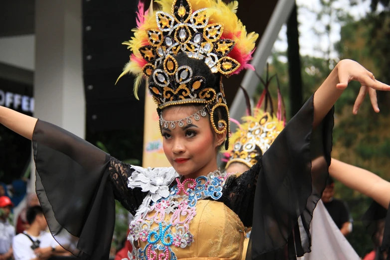 a close up of a person wearing a costume, by Basuki Abdullah, flickr, she is dancing, square, malaysian, feature