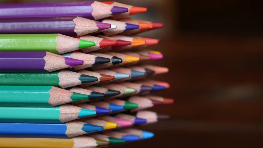 a stack of colored pencils sitting on top of each other, by Edward Corbett, 7 0 mm photo
