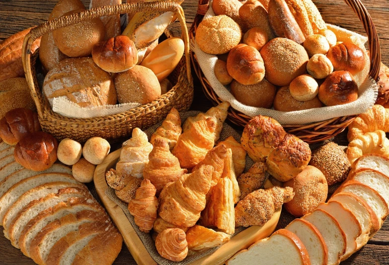 a table topped with lots of different types of bread, a picture, shutterstock, figuration libre, sun lighting, !!highly detailed!!, award-winning crisp details”, albuquerque