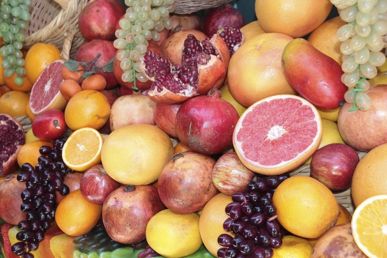 a pile of fruit sitting on top of a table, pexels, figuration libre, sukkot, full of colour 8-w 1024, bottom angle, many details