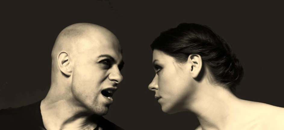 a couple of men standing next to each other, pexels, antipodeans, portraits of a woman enraged, sepia, bald, facing each other