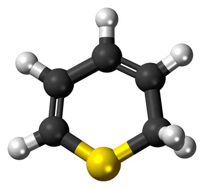 a close up of a model of a molecule, by Joseph Bowler, polycount, synthetism, black and white and gold”, yellow aureole, black-water-background, tetrachromacy