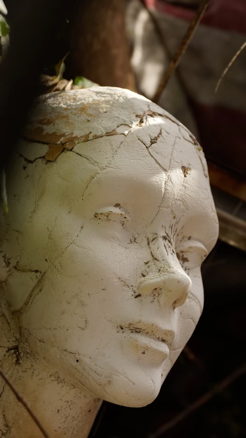 a close up of a statue of a woman's head, a marble sculpture, by Edward Corbett, featured on zbrush central, new sculpture, cracked porcelain face, white mask, sculpture work in progress, raku