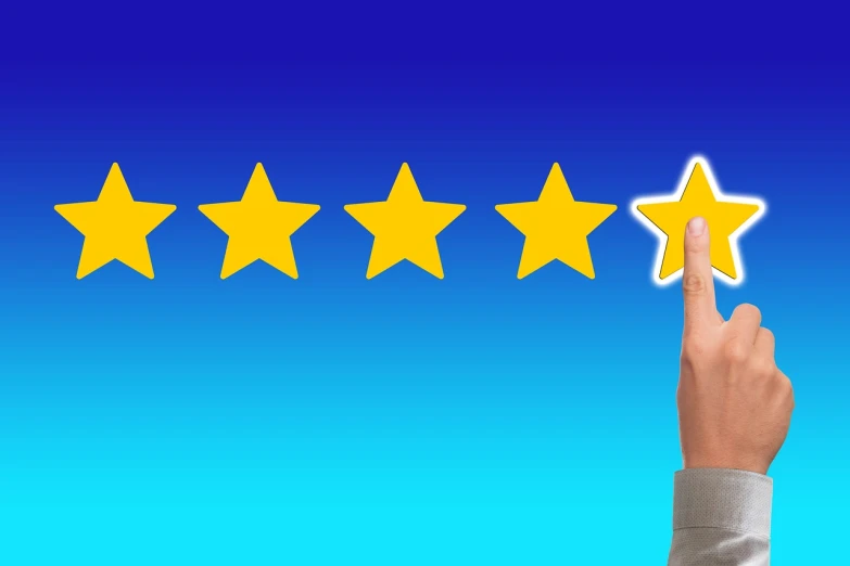 a hand pointing to five stars on a blue background, a stock photo, institutional critique, very professional, full device, star roof, front photo