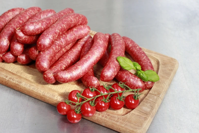 a bunch of sausage sitting on top of a cutting board, inspired by Wolfgang Letti, rasquache, close-up product photo