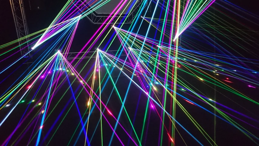 a bunch of lights that are in the air, a microscopic photo, by Jan Rustem, pexels, holography, star wars lasers, rave poster, shot on iphone 6, vivid lines
