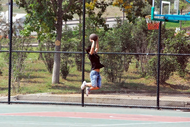 a person jumping in the air with a basketball, by Echo Chernik, arabesque, city park, netting, 4 0 9 6, [ realistic photo ]!!