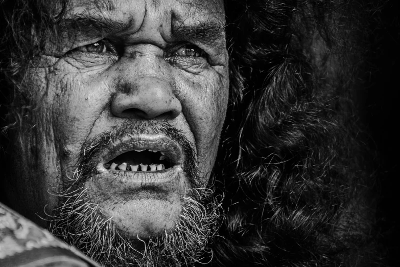 a black and white photo of a man with long hair, a black and white photo, pexels contest winner, fine art, gangrel, maori, closeup at the faces, hdr human detailed