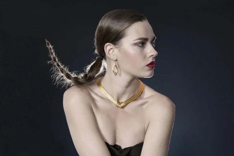 a woman in a black dress posing for a picture, a portrait, inspired by Elena Guro, trending on cg society, art nouveau, gold necklace, hair in slick low ponytail, gold and luxury materials, wearing gold detailed choker